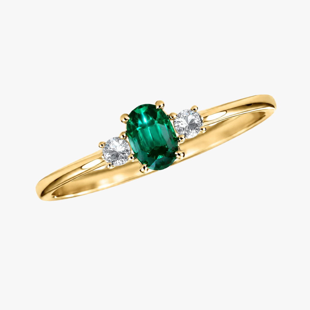Verlobugsring Triology mit Smaragd und 2 runden Diamanten in Gelbgold